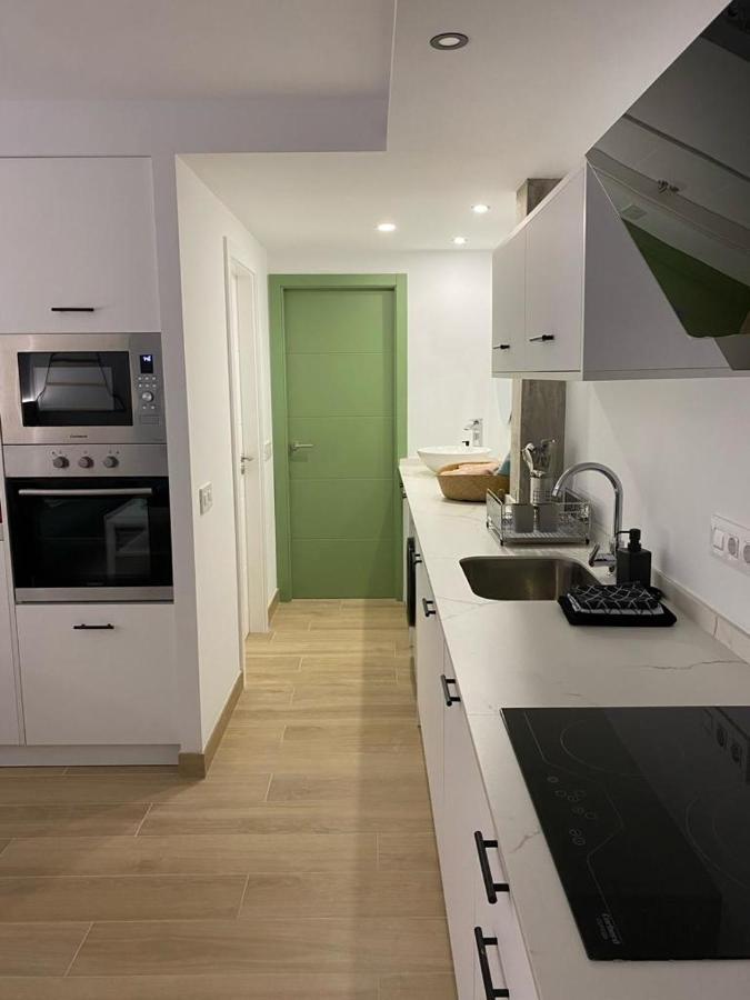 Detail Aqua Apartment ปูแอร์โตเดลาครูซ ภายนอก รูปภาพ