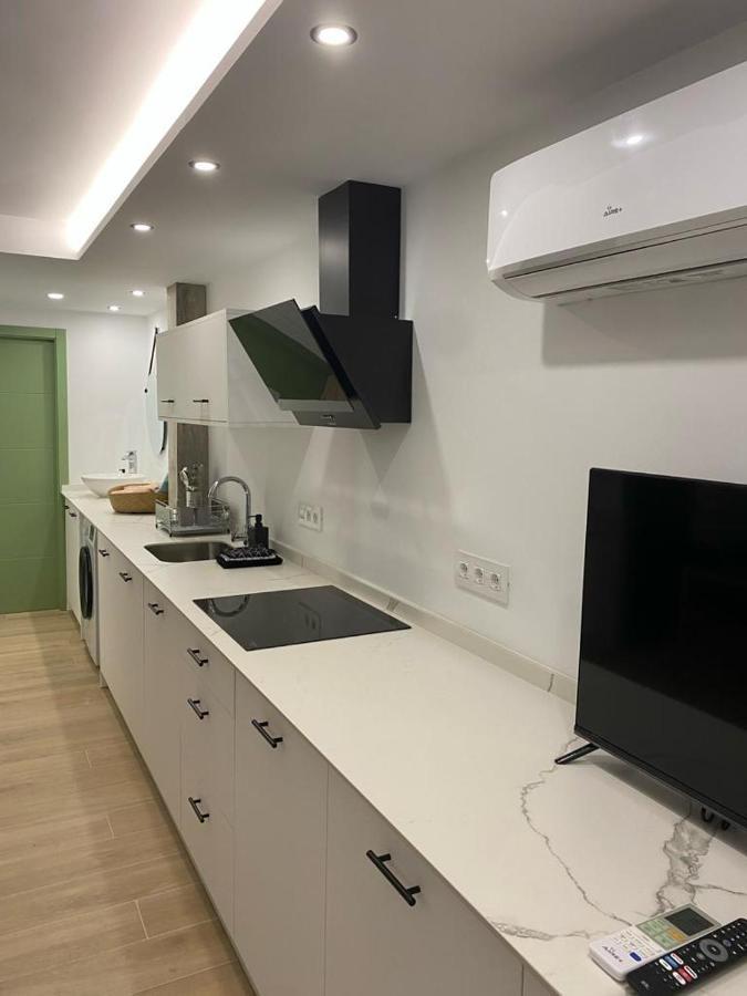 Detail Aqua Apartment ปูแอร์โตเดลาครูซ ภายนอก รูปภาพ